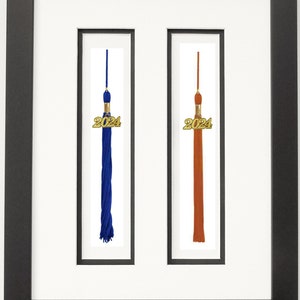 Multiple tassel openings and tassel boxes with 5x7 photos. Two to four tassel openings and may include a name plate opening.  Customize.