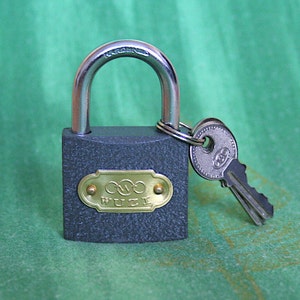 A small padlock with keys, Unused padlock
