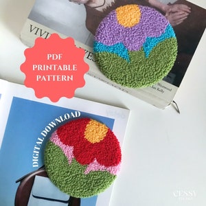 May include: Two colorful floral punch needle patterns, one with a red flower and one with a purple flower, on a white surface.  PDF Printable Pattern. Digital Download.
