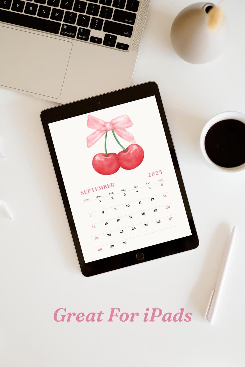May include: A digital calendar for September 2025 with a watercolor illustration of two red cherries with a pink bow on top. The calendar is displayed on a tablet.