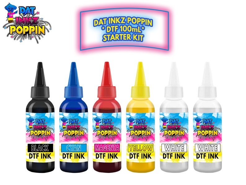 May include: A set of six bottles of DTF ink in black, cyan, magenta, yellow, and two white bottles. The bottles are labeled "DAT INKZ POPPIN" and the ink colors are printed below each bottle. The text "DTF 100mL STARTER KIT" is printed above the bottles.
