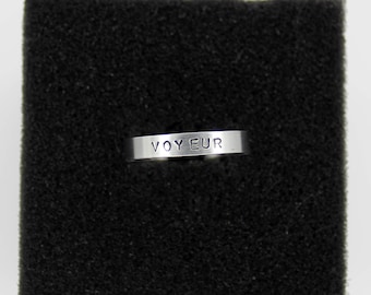 Anillo ajustable con sello de voyeur