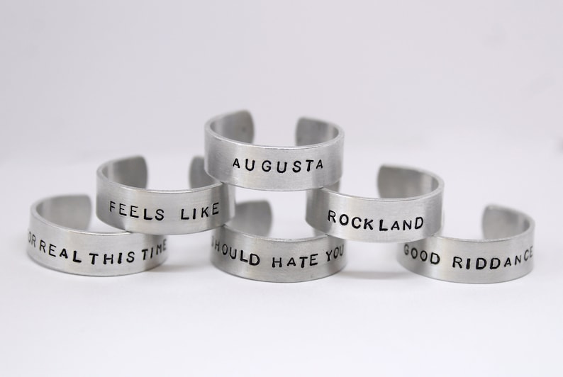 gracie abrams inspired hand stamped rings good riddance, amelie, feels like, rockland and more image 1