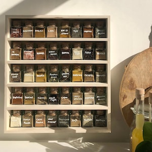 Wooden spice rack with 40 glass spice jars (Cork member)