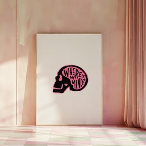 May include: A black and white illustration of a skull with the text "WHERE IS MY MIND?" inside the skull. The skull is pink.