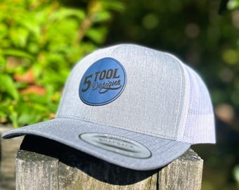 Custom Yupoong Trucker Hat | Engraved Leatherette Patch, Logo Cap