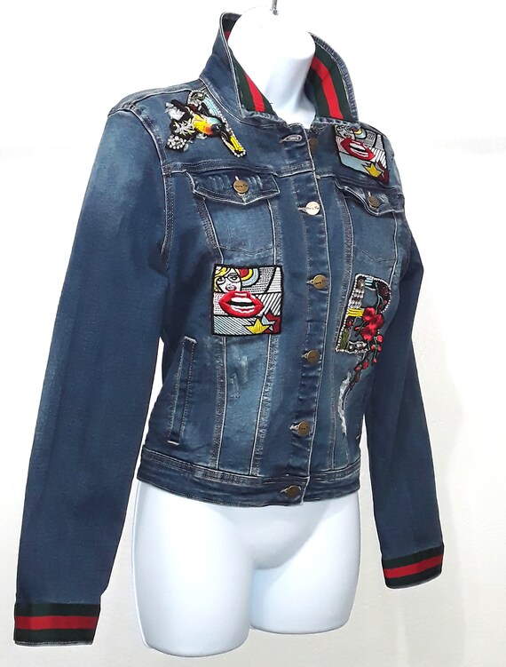 Distressed denim jacket with cheap patches