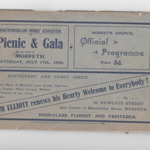 May include: A vintage advertisement for a picnic and gala event in Morpeth, England, on July 17, 1920. The ad features the Northumberland Miners' Association and the Morpeth Council. It also includes a promotion for Jim Elliott, a florist and fruiterer, who is offering a hearty welcome to everyone.