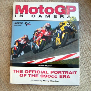 Multi signed - MotoGP in Camera The Official Portrait of the 990cc era. Julian Ryder. 1st 2007.