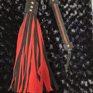 Black and red flail flogger