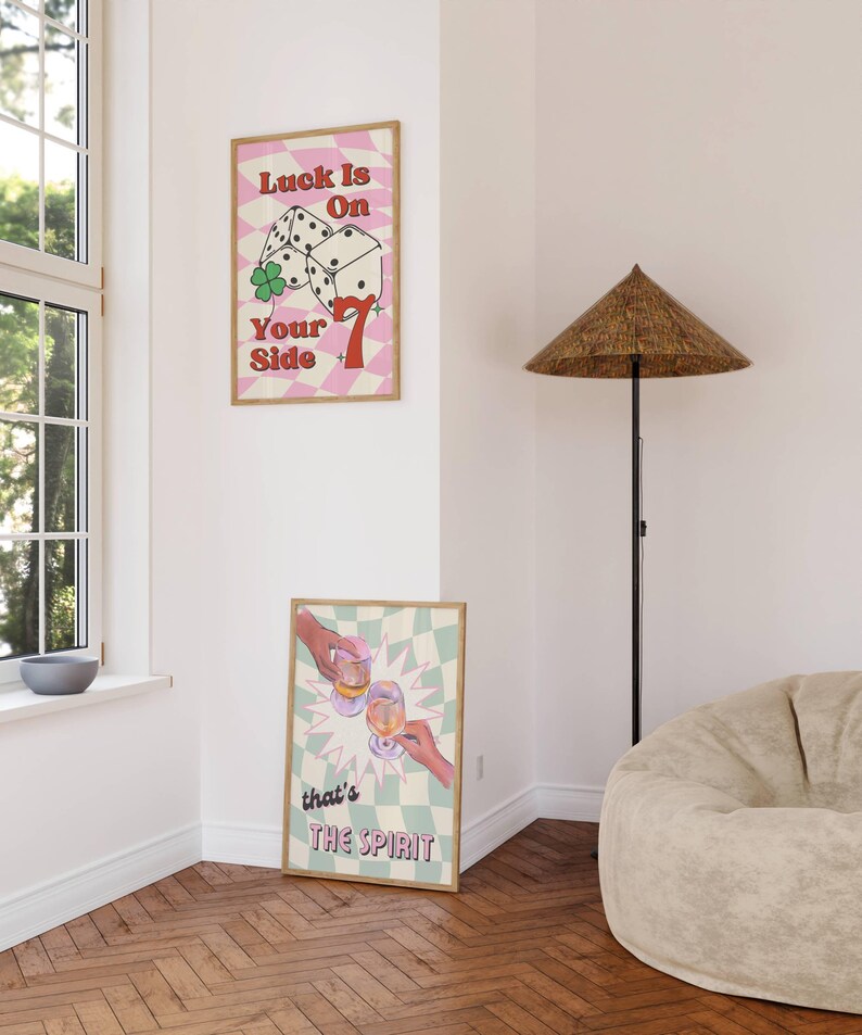 Set of 2 prints with Luck is on your side print with checkered background, dice, lucky 7 , and green clove. Print 2 has sage green checkered background, two glasses of wine,  champagne, cheers, with vintage font, that's the spirit.