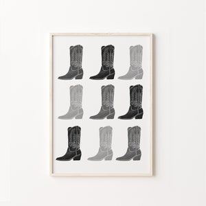 May include: A black and white print of nine cowboy boots in a repeating pattern. The boots are arranged in three rows of three. The boots are all the same style, but they are different shades of gray. The boots are all facing the same direction.