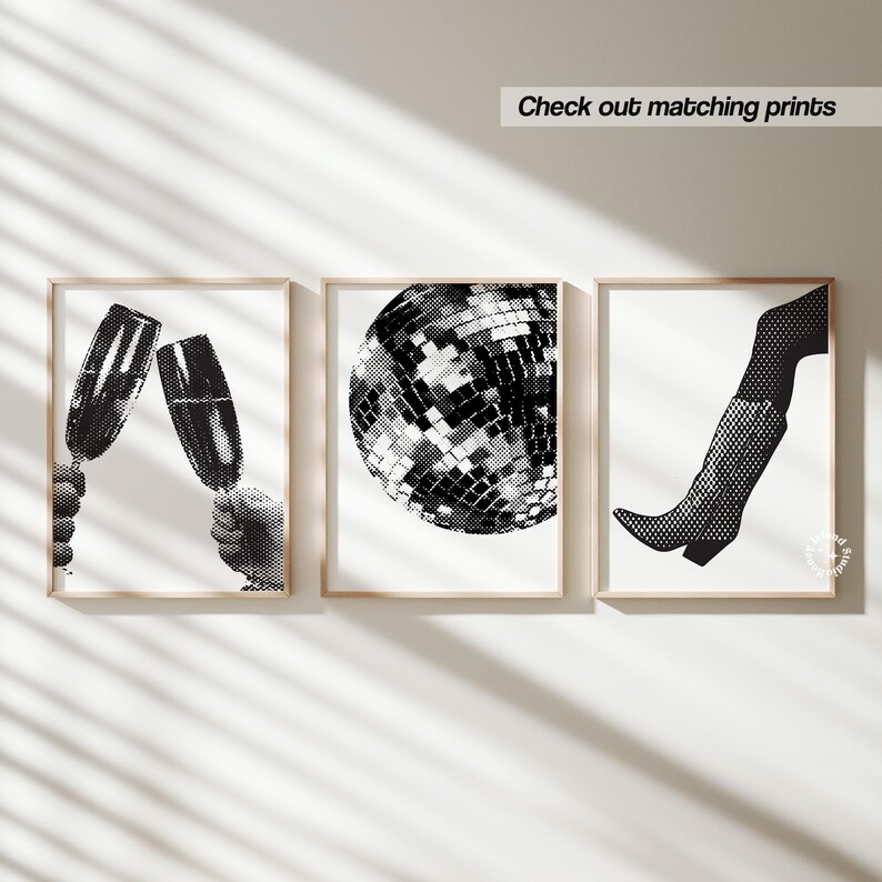 May include: Three black and white illustrations in frames. The first shows two champagne flutes clinking together. The second shows a disco ball. The third shows a black boot with a pointed toe.