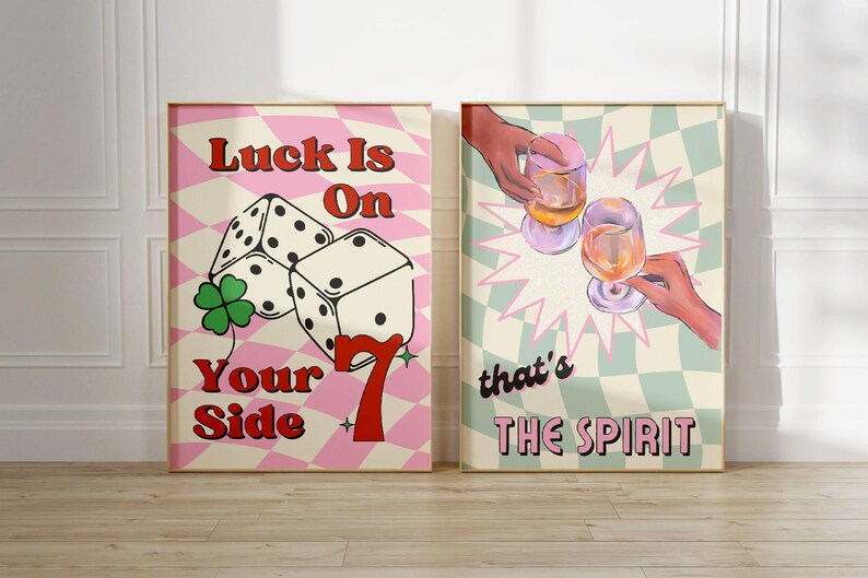 Set of 2 prints with Luck is on your side print with checkered background, dice, lucky 7 , and green clove. Print 2 has sage green checkered background, two glasses of wine,  champagne, cheers, with vintage font, that's the spirit.