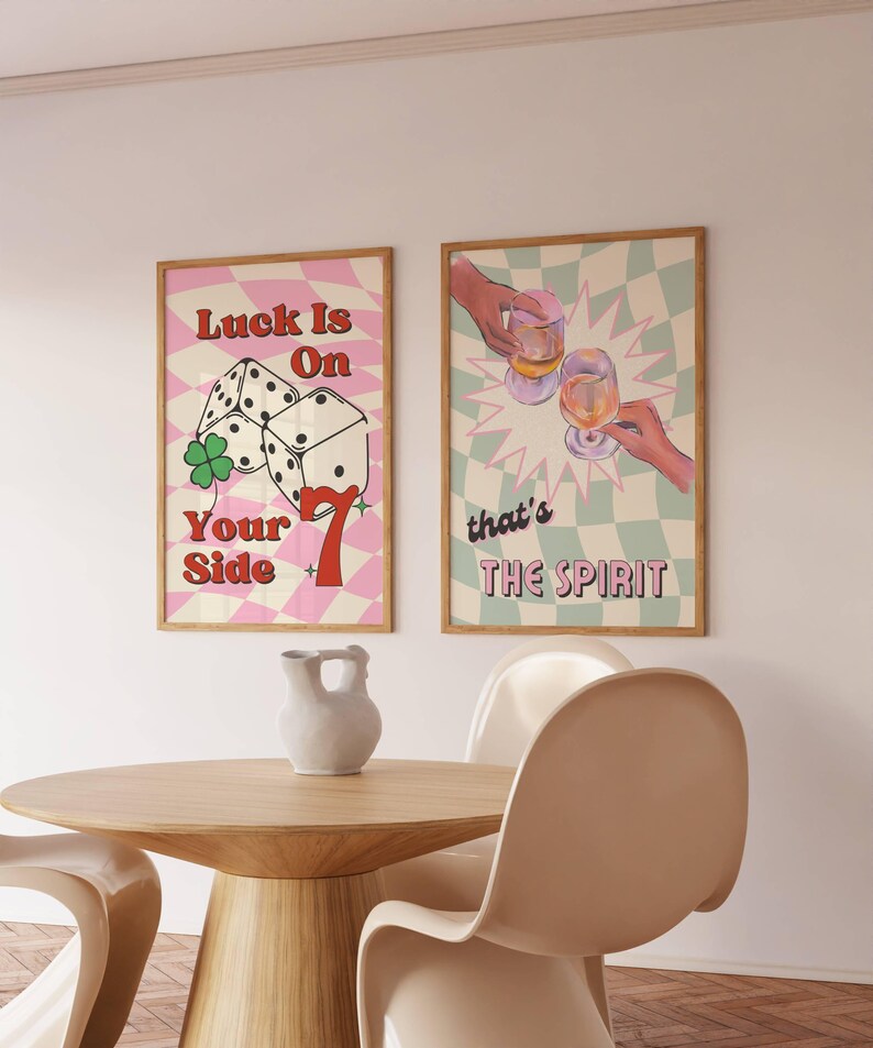 Set of 2 prints with Luck is on your side print with checkered background, dice, lucky 7 , and green clove. Print 2 has sage green checkered background, two glasses of wine,  champagne, cheers, with vintage font, that's the spirit.