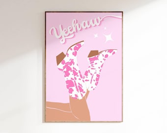 May include: Pink and white cow print cowboy boots with the word "Yeehaw" in white text on a pink background.