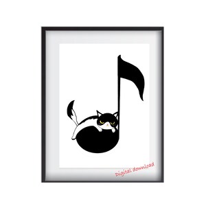 May include: A framed art print featuring a black and white illustration of a cat resting on a musical note. The cat has black and white fur with yellow eyes. The words "Digital download" are in the bottom right corner.