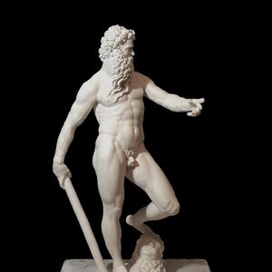 May include: A white plaster statue of a nude male figure with a beard and long hair. The figure is standing with one leg raised and holding a staff in his left hand.