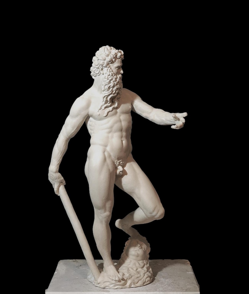 May include: A white plaster statue of a nude male figure with a beard and long hair. The figure is standing with one leg raised and holding a staff in his left hand.