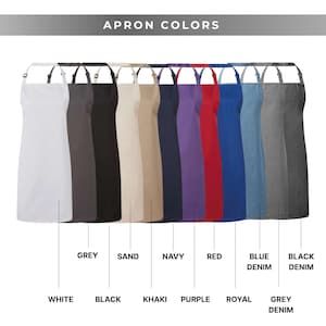 May include: A collection of aprons in various colors, including white, black, grey, khaki, navy, purple, red, royal blue, blue denim, and black denim. The text "APRON COLORS" is displayed at the top, with color names labeled below each apron.