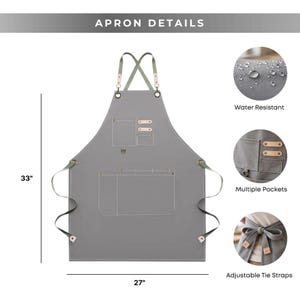 May include: Gray apron with multiple pockets and adjustable tie straps. The apron is 33 inches long and 27 inches wide. Features include water resistance and leather accents. The apron details are displayed in the image.
