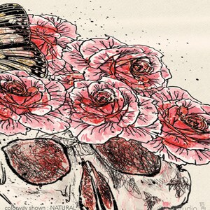 May include: Illustration of a skull with a bouquet of pink roses and a butterfly. The artwork is in a watercolor style with black outlines and a natural colorway. The text "colorway shown: NATURAL" is visible.
