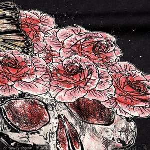 May include: Black graphic design featuring a skull with a bouquet of pink roses and a butterfly. The artwork is detailed with red and black shading, set against a black background. The text "colorway shown: BLACK" is visible.