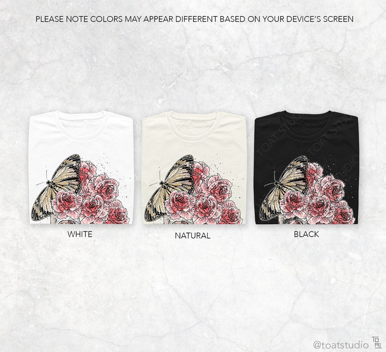 May include: Three t-shirts in white, natural, and black, each featuring a butterfly and rose design. The butterfly has tan and black wings, and the roses are pink. The text "WHITE", "NATURAL", and "BLACK" are below each shirt.