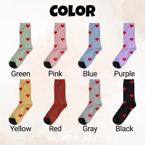May include: A variety of colorful socks, each adorned with a pattern of red hearts. The socks come in green, pink, blue, purple, yellow, red, gray, and black. The word "COLOR" is at the top of the image.