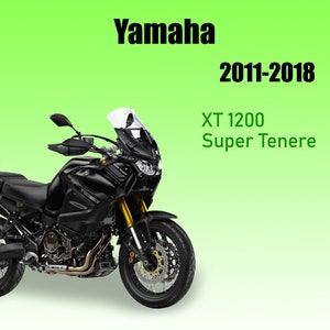 Puede incluir: Una motocicleta Yamaha XT 1200 Super Tenere negra con un parabrisas. La motocicleta tiene detalles dorados y un asiento negro. El texto "Yamaha" y "2011-2018" es visible en la imagen.