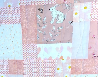 34”x34” baby girl bunny quilt, cotton fabric, pinks, peach. Disappearing 9 patch design.