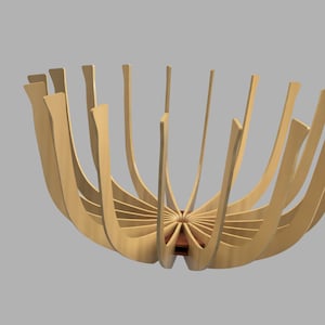 May include: A wooden bowl with a unique design, featuring multiple curved slats that create a radial pattern. The bowl is made of light brown wood and has a natural finish.