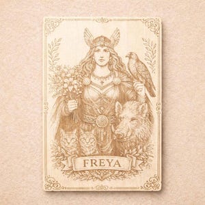 May include: A sepia-toned illustration of Freya, a figure from Norse mythology, holding flowers and a falcon. The image includes cats, a boar, and the name "FREYA" on a banner. The artwork has decorative borders.