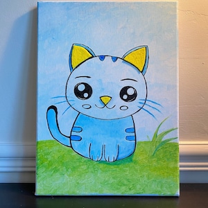 Small blue and yellow cat