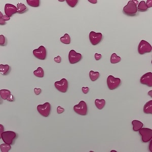 Uv activated heart charms