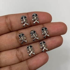 Skull nail charm