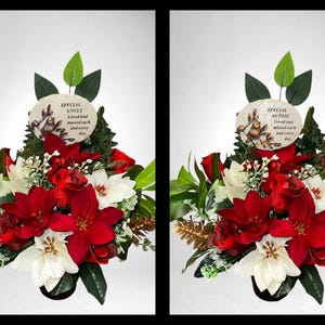 May include: Two red and white flower arrangements with a memorial plaque. The plaque on the left reads "Special Uncle Loved and missed each and every day." The plaque on the right reads "Special Auntie Loved and missed each and every day."