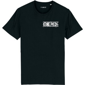 May include: Black t-shirt with a white graphic of the "One Piece" logo, featuring the Japanese text "ワンピース" above the logo.