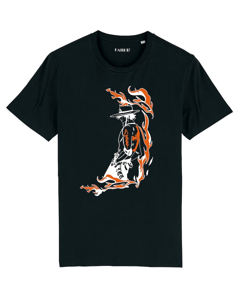 May include: Black t-shirt with a white silhouette of a character with a hat and flames behind them. The character has the word "Ace" written on their arm.