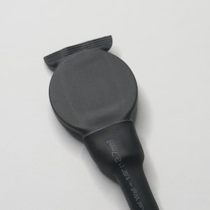 May include: Black heat shrink tubing with a round end cap. The tubing has the text "12-14mm" printed on it.
