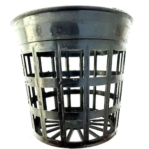 May include: A black plastic net pot with a cylindrical shape and a grid-like design. The pot has a slightly flared top and is designed for hydroponic gardening or other plant cultivation methods. The pot is made of durable plastic.