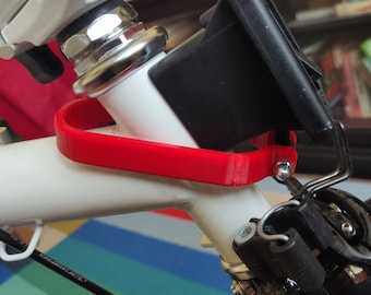 Brompton carrier block pull/quick release. Red/White or Black