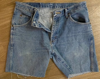 hand cropped thrifted wrangler light wash jean shorts