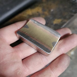 Steel brass and copper Haptic coin. Worry stone, haptic stone