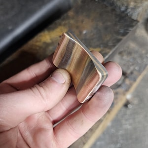 Cu Mai worry stone. Steel brass and copper Haptic coin. Worry stone, haptic stone