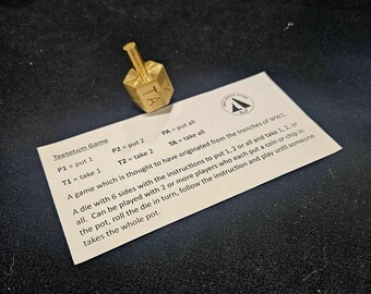 Teetotum game. Brass spinning top game. Drinking game Travel game. Family games night. Gambling game.