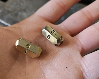 Small Hand forged numbered brass pill dice 20mm Solid Brass. Hexagonal dice. Roman dice.