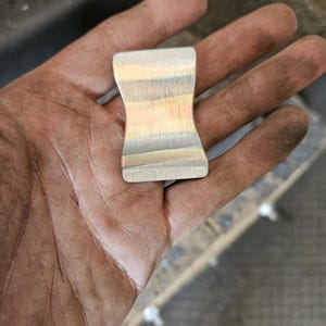 Cu Mai worry stone. Steel brass and copper Haptic coin. Worry stone, haptic stone