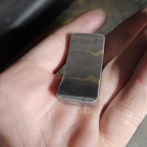 Steel and Brass worry stone. Steel brass and Haptic coin. Worry stone, haptic stone, touch stone