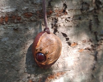 Red and gold glass beads, sleek and dark avocado stone pendant necklace